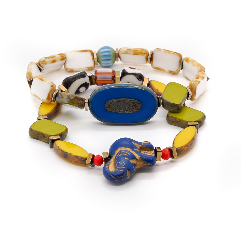 Cheerful Elephant Bracelet Set with vibrant orange crystal beads and colorful African beads.