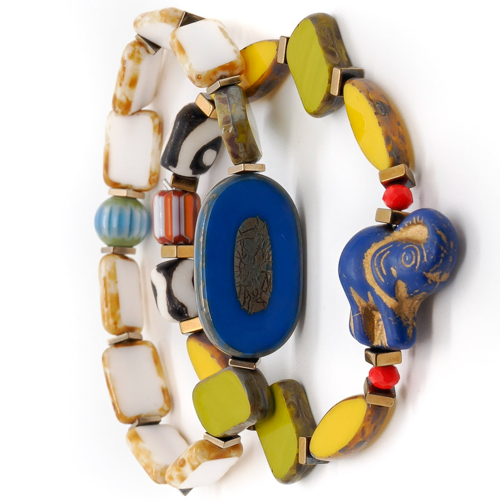 Unique combination of Nepal Eye beads and gold hematite stone spacers in the Cheerful Elephant Bracelet Set.