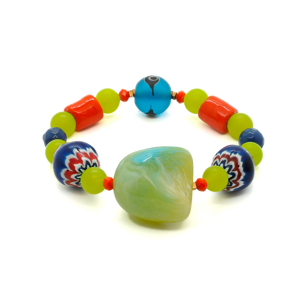 This Color of Life Bracelet features eye-catching African beads, green and blue jade stone beads, Nepal beads, and a protective evil eye bead. 