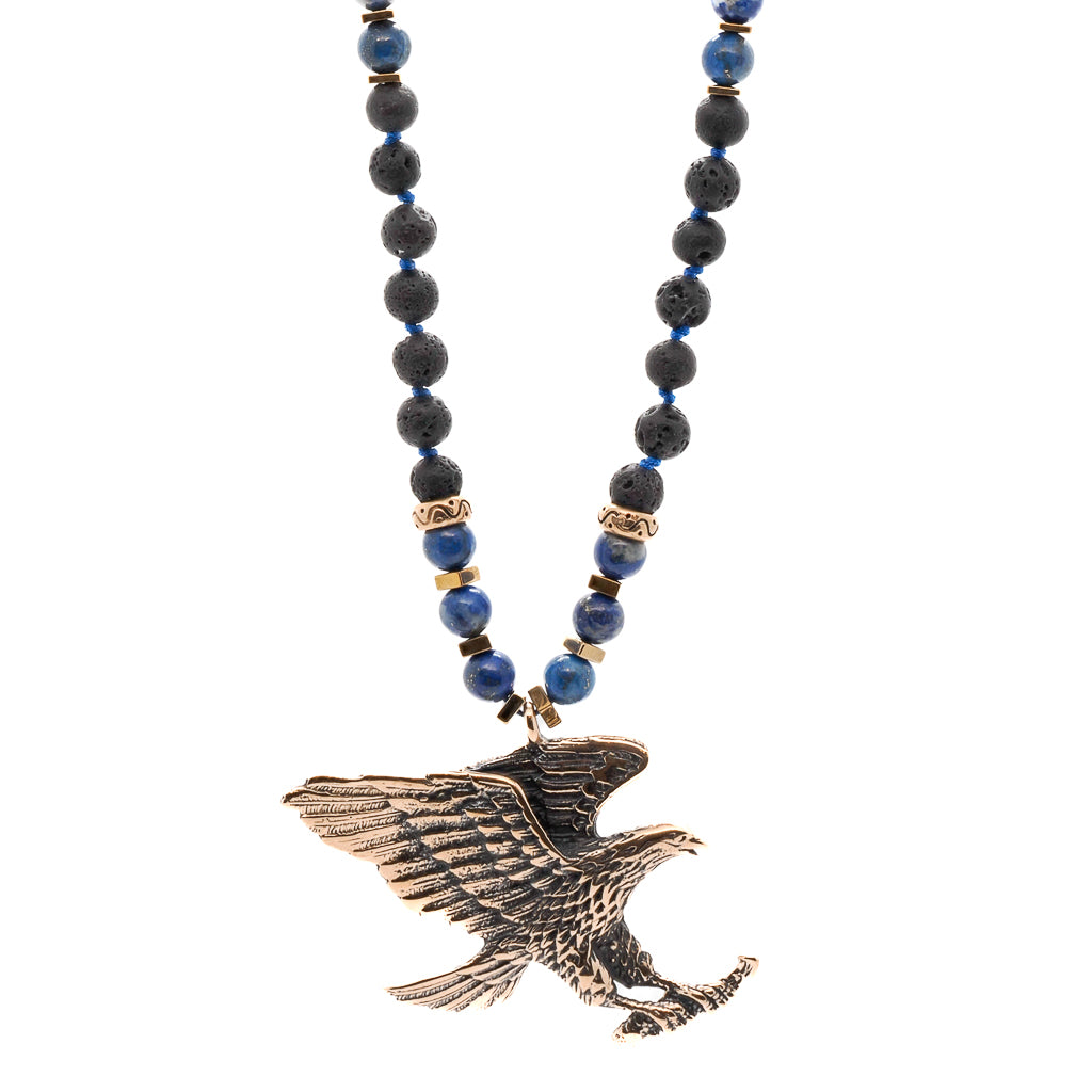 Handcrafted Eagle Spirit Necklace with Lava Rock and Lapis Lazuli stones, representing freedom and grounding energy.