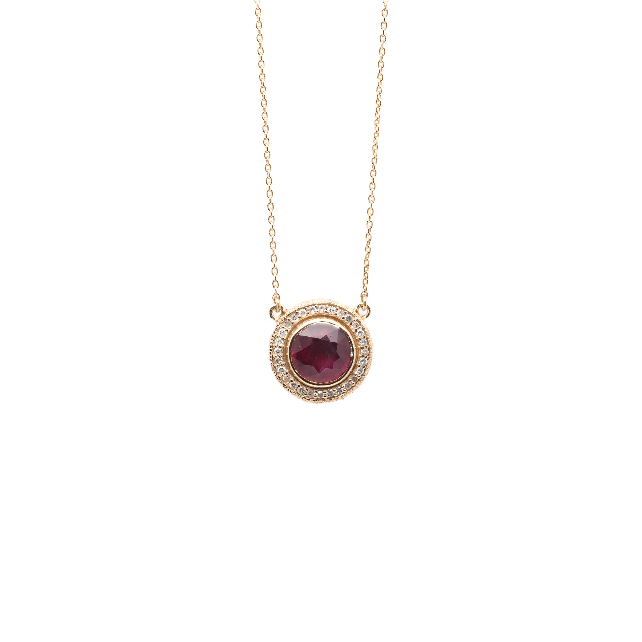 the Elegant Ruby & Diamond Necklace showcasing the stunning 14k yellow gold pendant adorned with a vibrant 1.750ct natural ruby and sparkling 0.40ct diamonds.