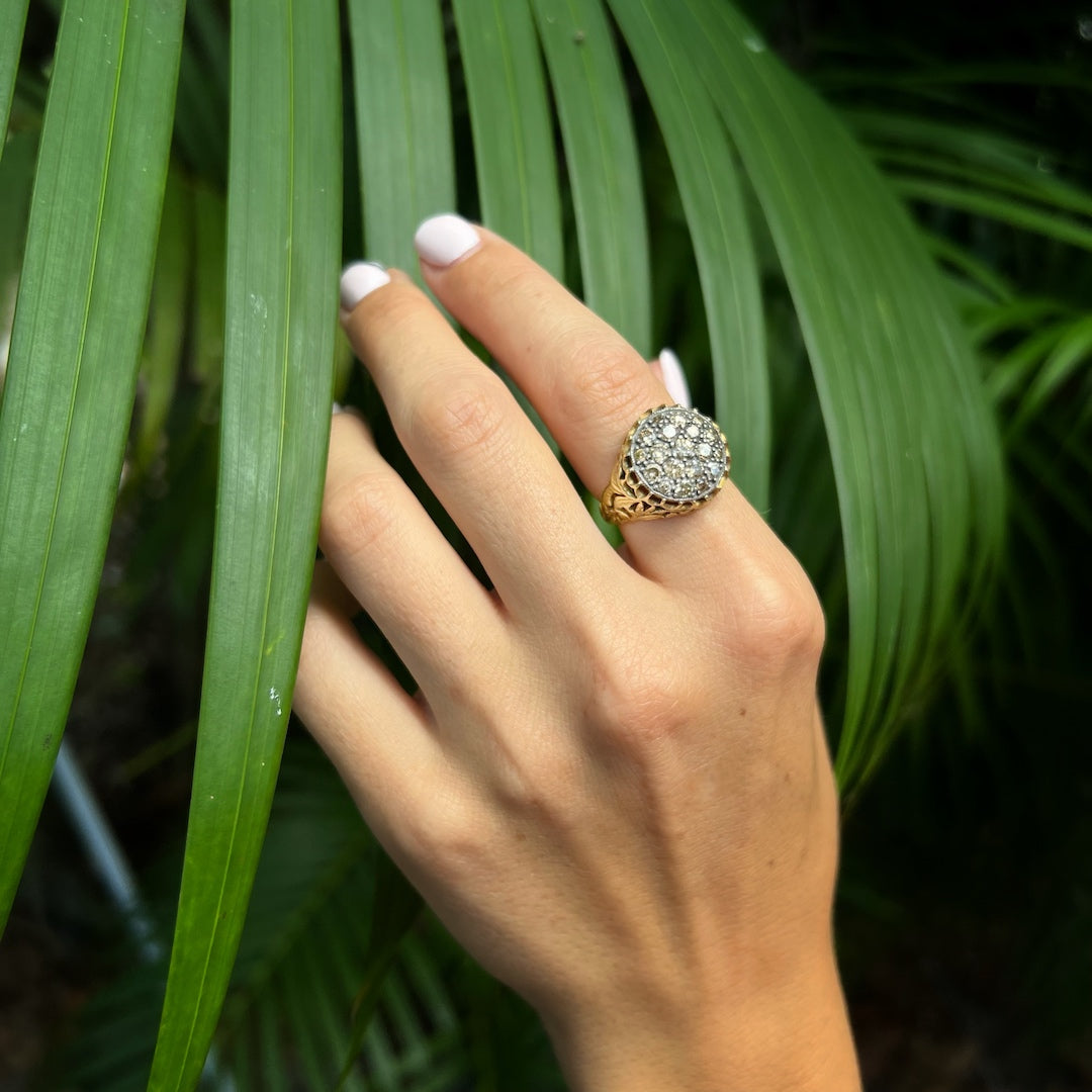 Hand model showcasing the handcrafted elegance of the Gold and Diamond Ring, symbolizing love and faithfulness with its sparkling brown diamonds.