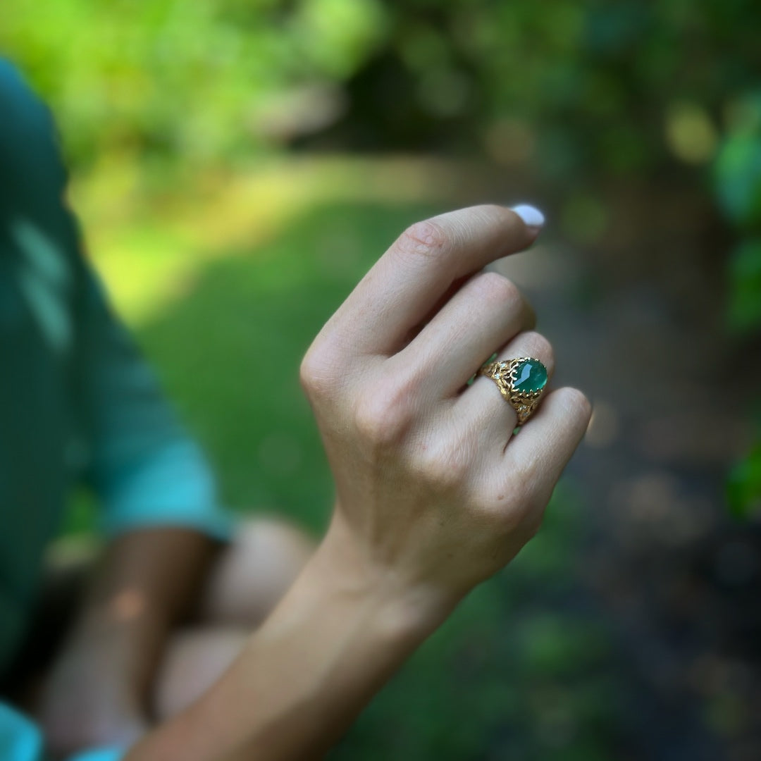 Hand model wearing the exquisite Emerald &amp; Diamond Teardrop Ring, adorned with a mesmerizing 2.88ct emerald and delicate diamond accents, radiating elegance and sophistication.