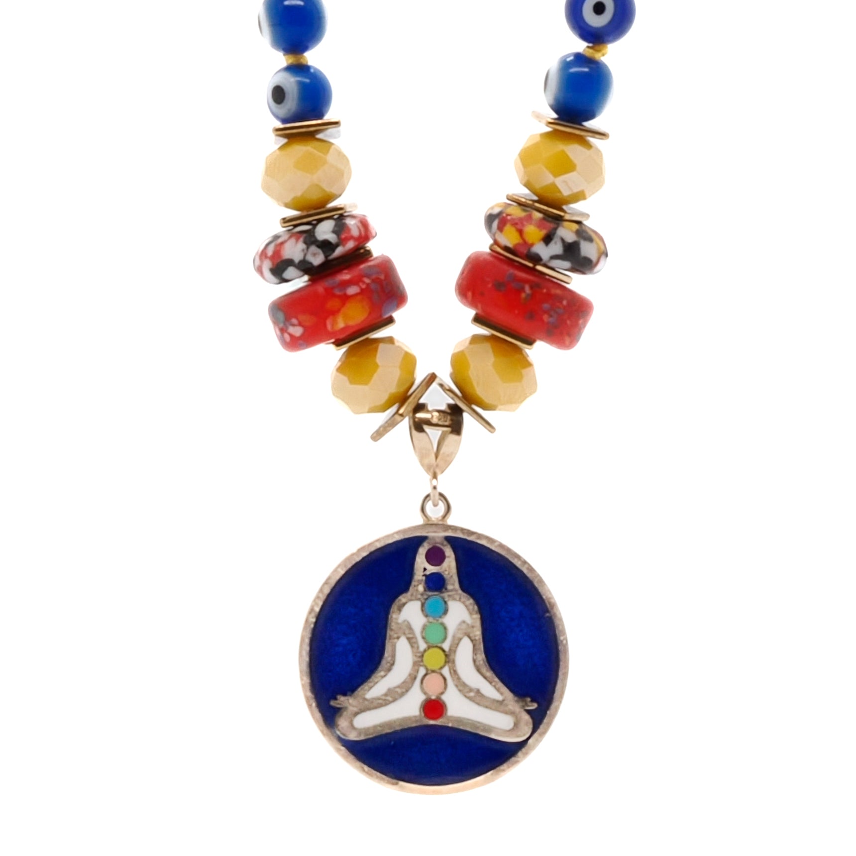 A powerful and protective handmade necklace featuring evil eye beads, colorful African beads, and Nepal meditation beads. The necklace also showcases a 925 silver 14k gold plated chakra yoga pendant with colorful enamel, symbolizing the balance and alignment of the body&#39;s energy centers.