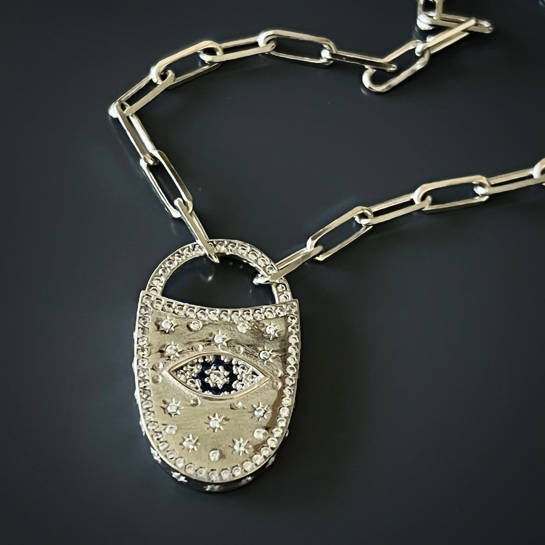 Elegant Evil Eye Lock Choker Necklace adorned with zircon stones, adding a touch of sparkle and charm to your look.