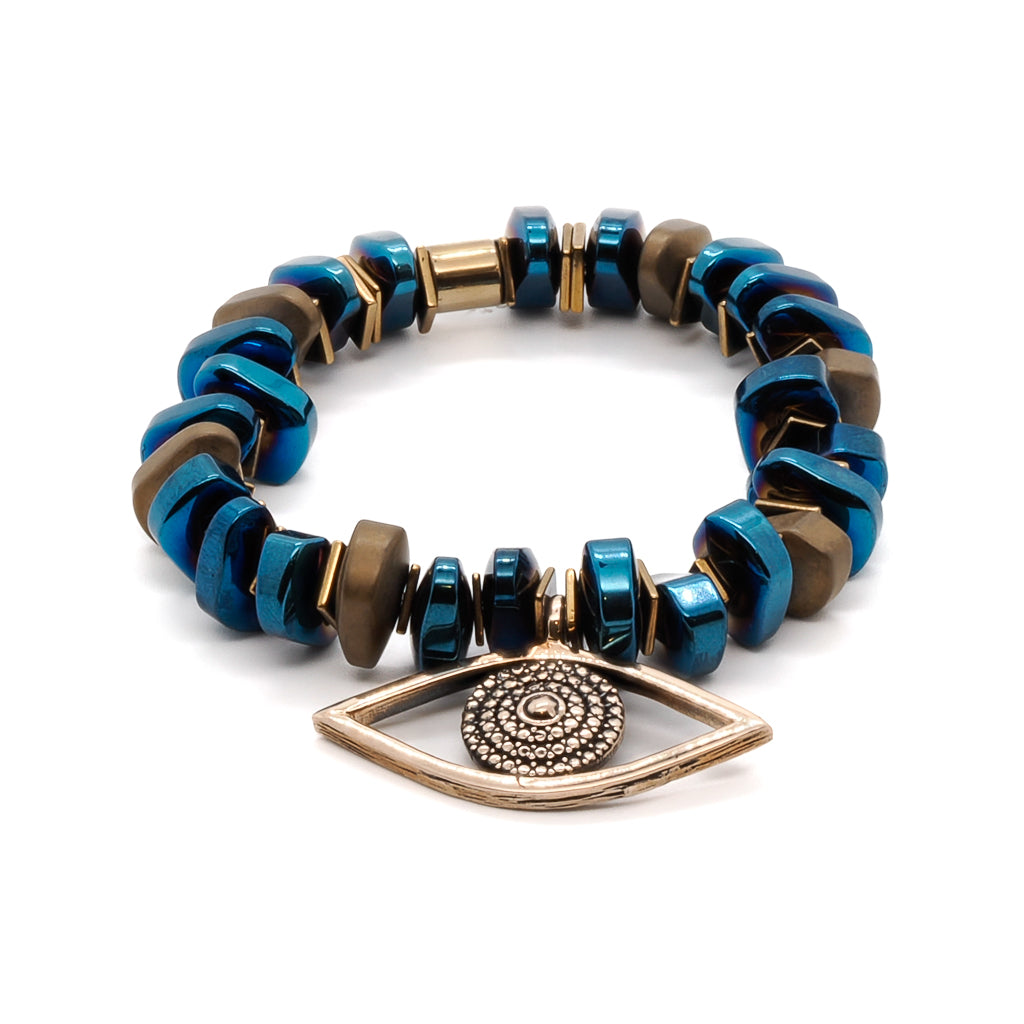 The Evil Eye Protector Bracelet, a captivating accessory featuring a gold-plated bronze evil eye charm and matte gold and blue hematite stone beads for added protection and style.