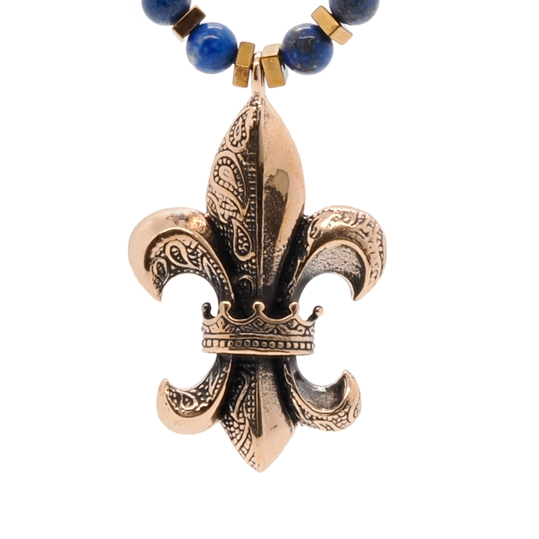 Unique Fleur de Lis Pendant Necklace - Handmade jewelry with lava rock and lapis lazuli stone beads, and a bronze pendant, offering a meaningful and stylish addition to your spirit.