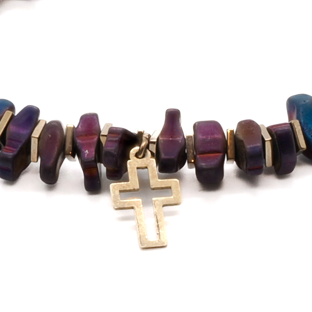 Handmade Gold Cross Bracelet - An image featuring the beautifully crafted Gold Cross Bracelet, adorned with a Sterling silver 18k gold plated cross charm. The combination of the blue and purple hematite nugget beads and gold color hematite stone spacers creates a captivating and meaningful accessory.