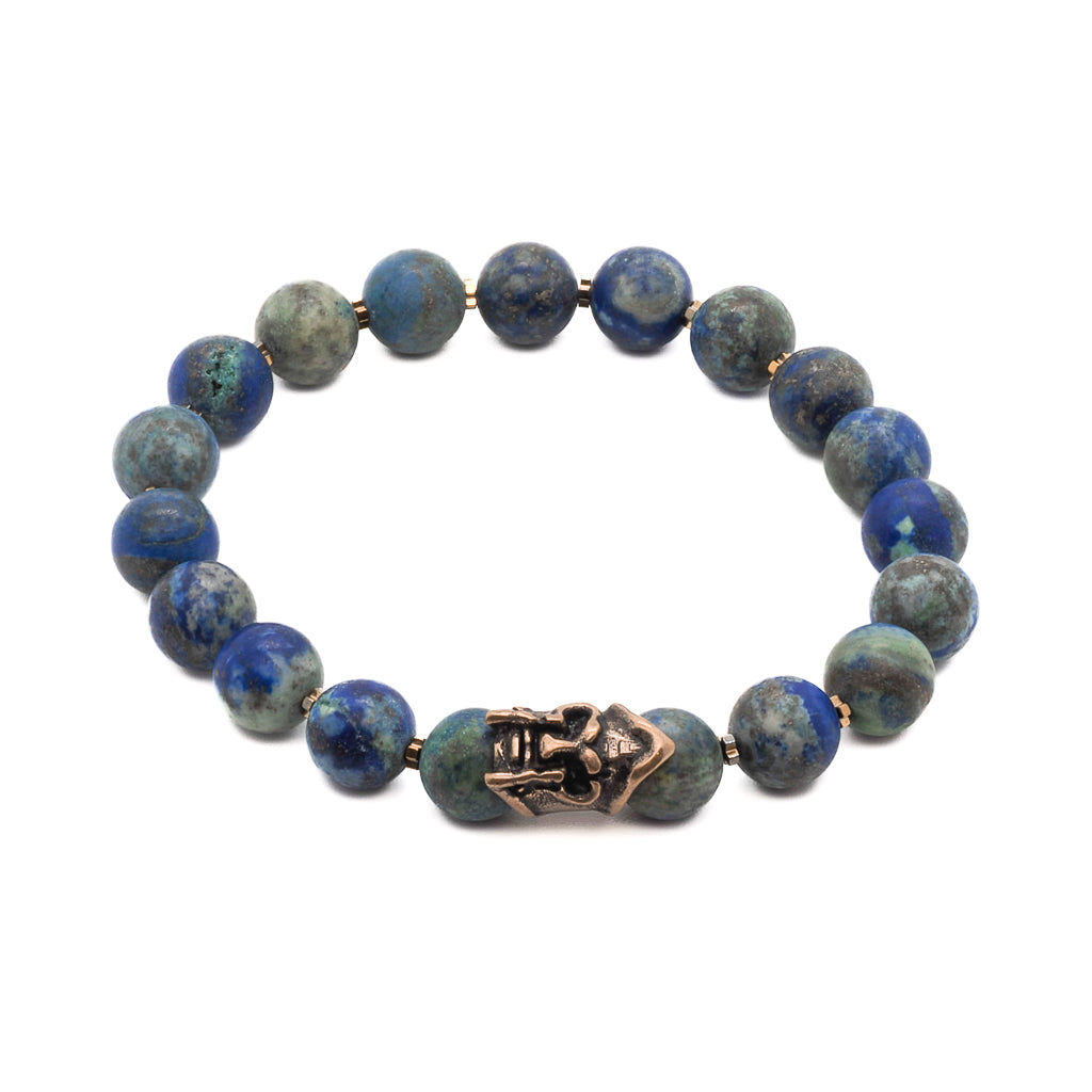 A close-up view of the Green World Bracelet, showcasing the beautiful 10mm azurite stone beads. The beads have a deep green color with natural patterns that add a touch of organic beauty to the bracelet. 