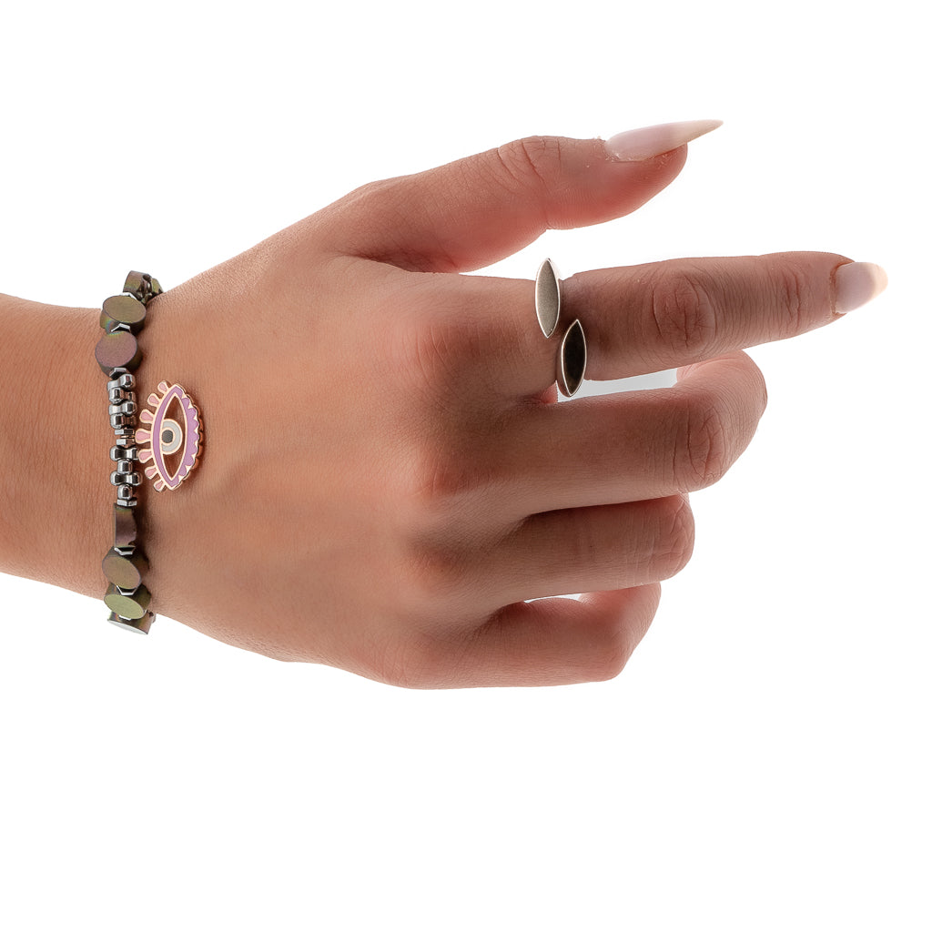 A hand wearing the Guardian Eye Agate Bracelet, demonstrating how it beautifully adorns the wrist. 