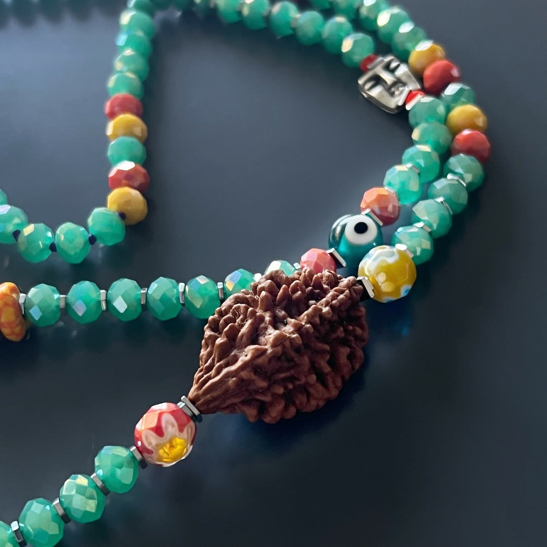 Necklace showcasing the colorful Nepal Evil Eye beads and glass evil eye bead, providing protection and warding off negative energy.