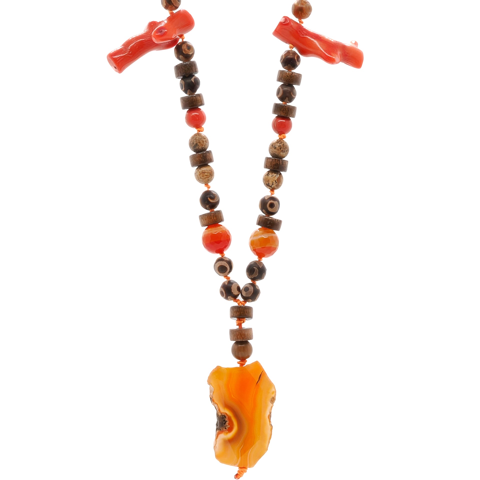 Close-up of the Healing Agate Necklace showcasing the vibrant orange agate pendant, with its unique patterns and smooth surface, making it a focal point of the necklace.