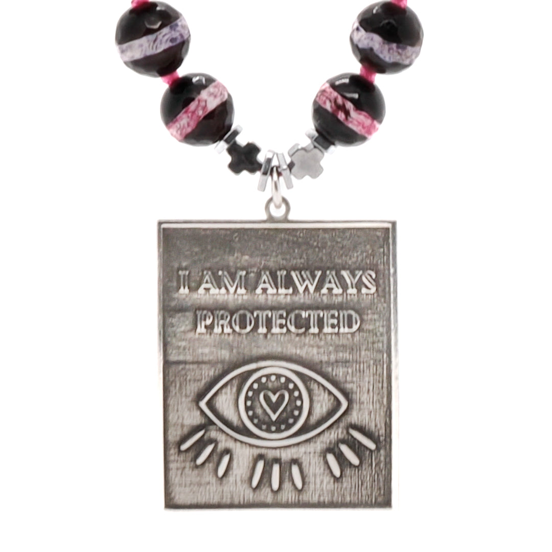 Embrace good fortune with the I Am Always Protected Necklace, handmade with love and featuring a striking blue African bead.
