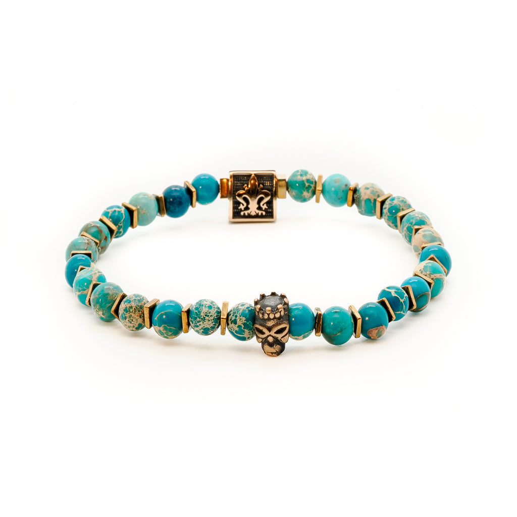 Close-up of the Inner Harmony Bracelet, showcasing the intricate bronze gold-plated skull king accent bead.