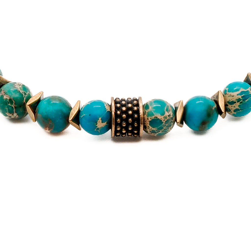 The Inner Peace Men&#39;s Bracelet showcasing the calming Blue Variscite stone beads and the elegant Fleur de lis accent bead.