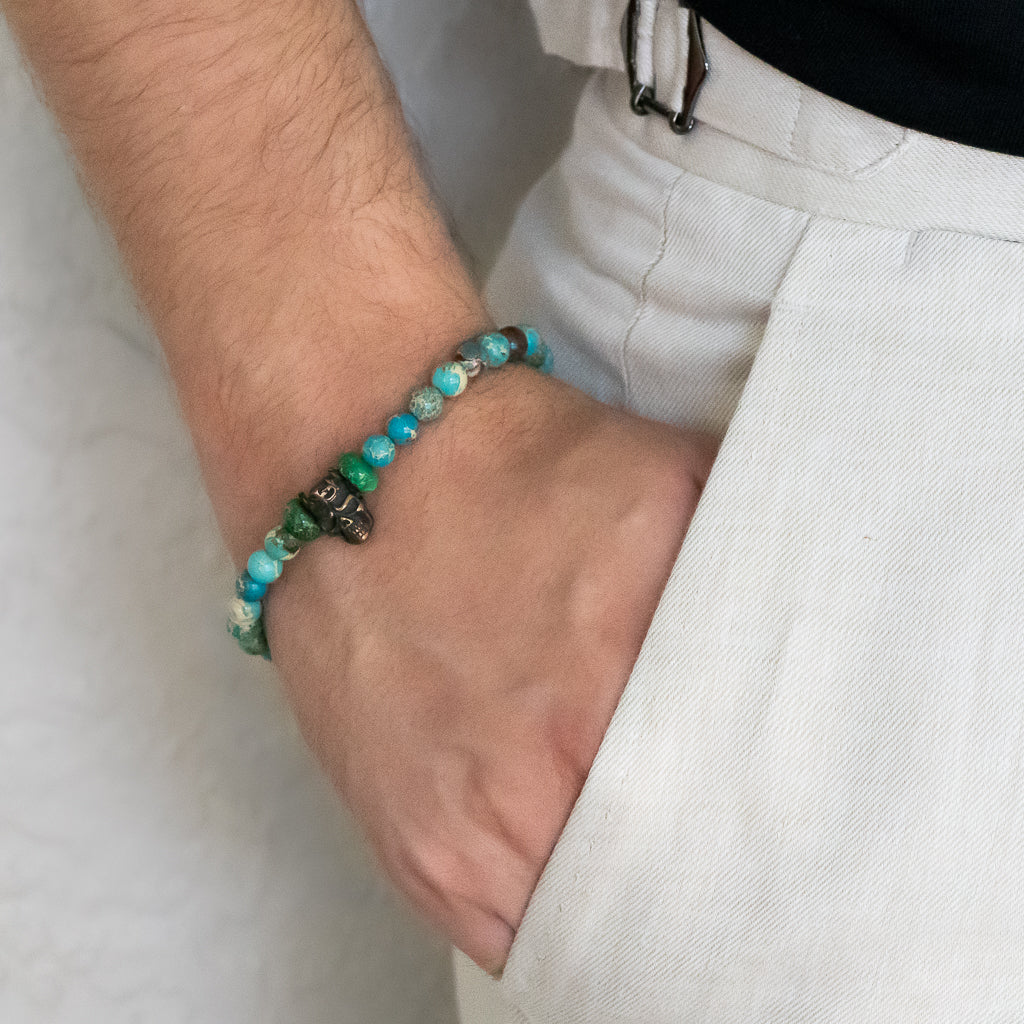 A model wearing the King Skull Bracelet, radiating confidence and strength with this statement piece that adds a touch of edginess and individuality to his style.