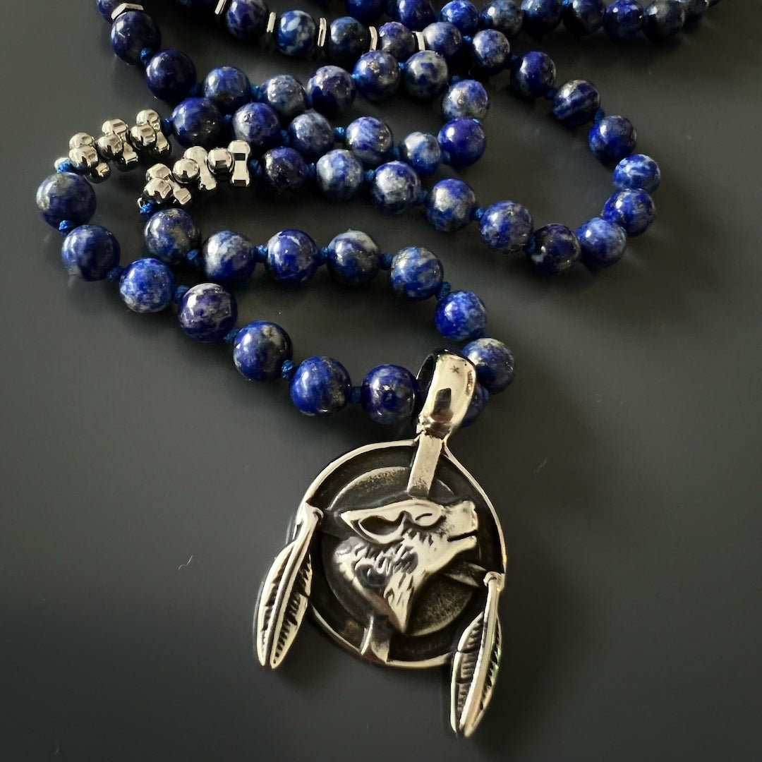 Handmade Lapis Lazuli Brave Wolf Necklace, expressing a wild and free spirit with its tribal-inspired design.
