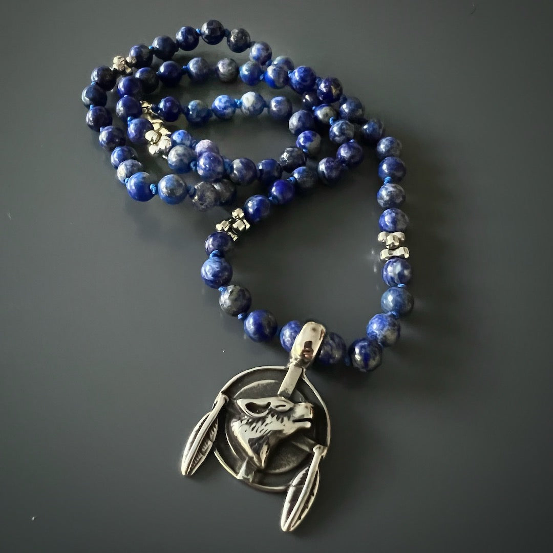 Handmade Lapis Lazuli Necklace showcasing the brave spirit of the wolf.