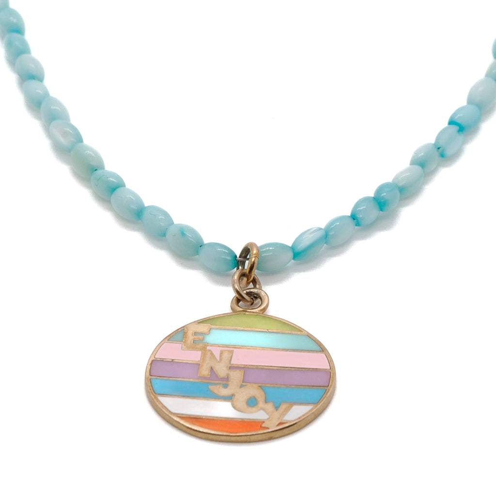 Larimar stone and colorful enamel pendant on the Larimar Choker Enjoy Necklace.
