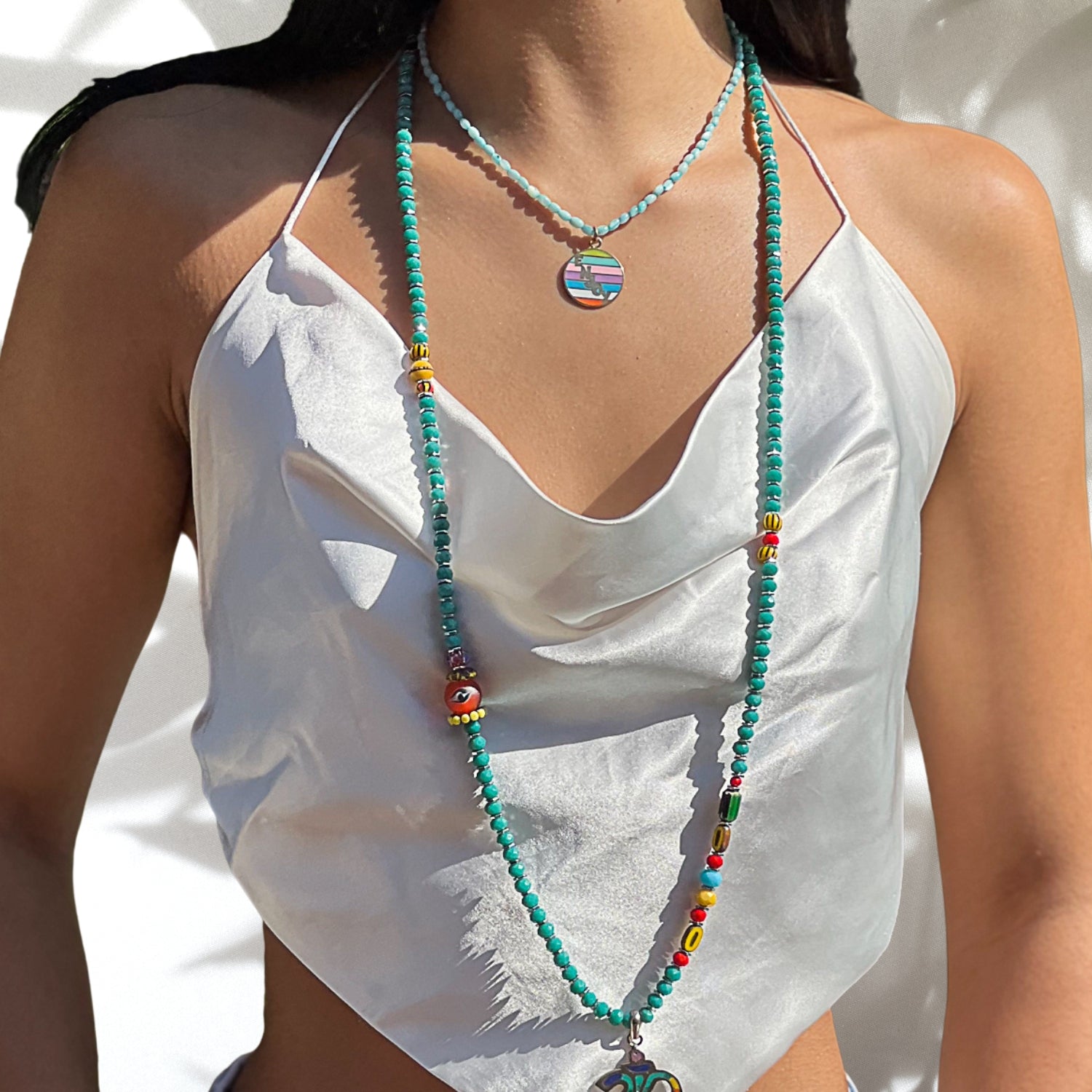 Showcasing the vibrant and meaningful Larimar Choker Enjoy Necklace on a model.