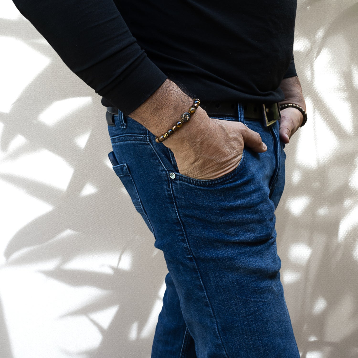 Model wearing the Lion Men Bracelet, showcasing its masculine design and powerful symbolism, adding a touch of confidence and style to any outfit.