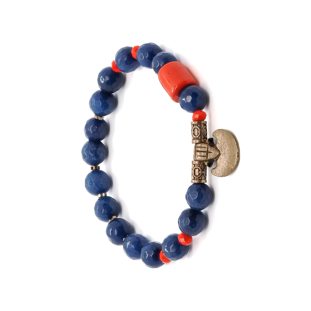 Discover the strength and determination of the Martial Bracelet, featuring Blue Agate and Orange Crystal beads, a vibrant Red focal bead, and Bronze accents.