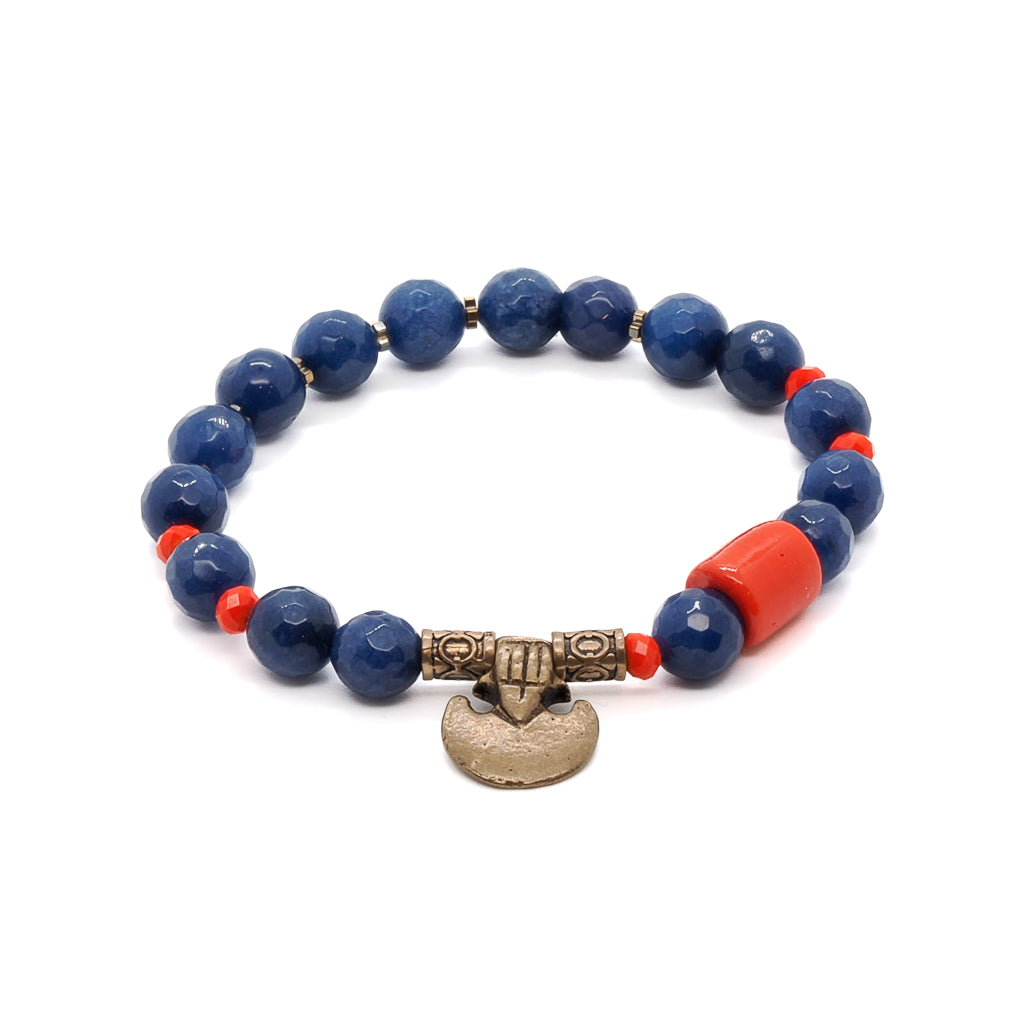 Embrace empowerment with the Martial Bracelet, featuring Blue Agate and Orange Crystal beads, a large Red bead, and Bronze accents.