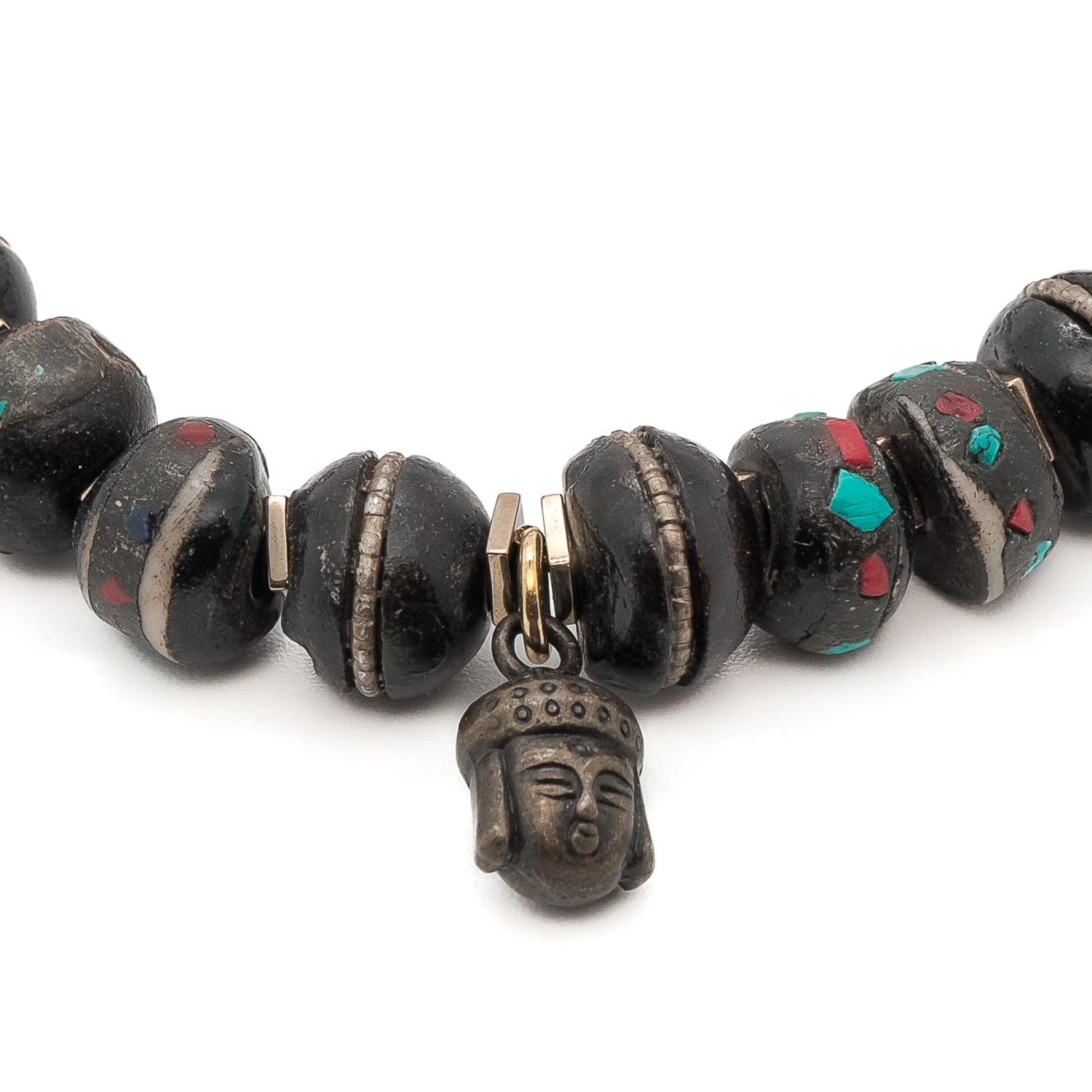 Discover the spiritual essence of the Meditation Bracelet, adorned with inlaid Nepal yak bone beads and a captivating Buddha charm.