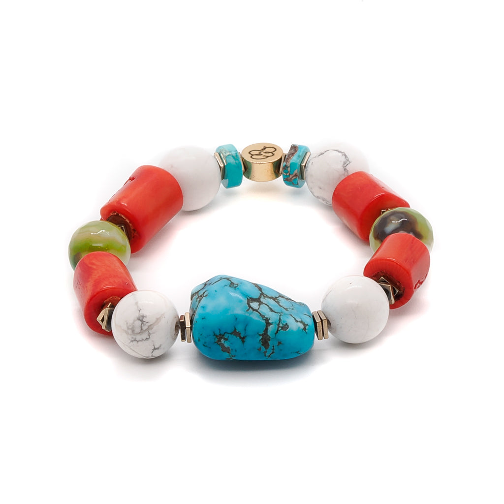 The Mila Bracelet, a vibrant and meaningful accessory featuring a large natural turquoise stone.