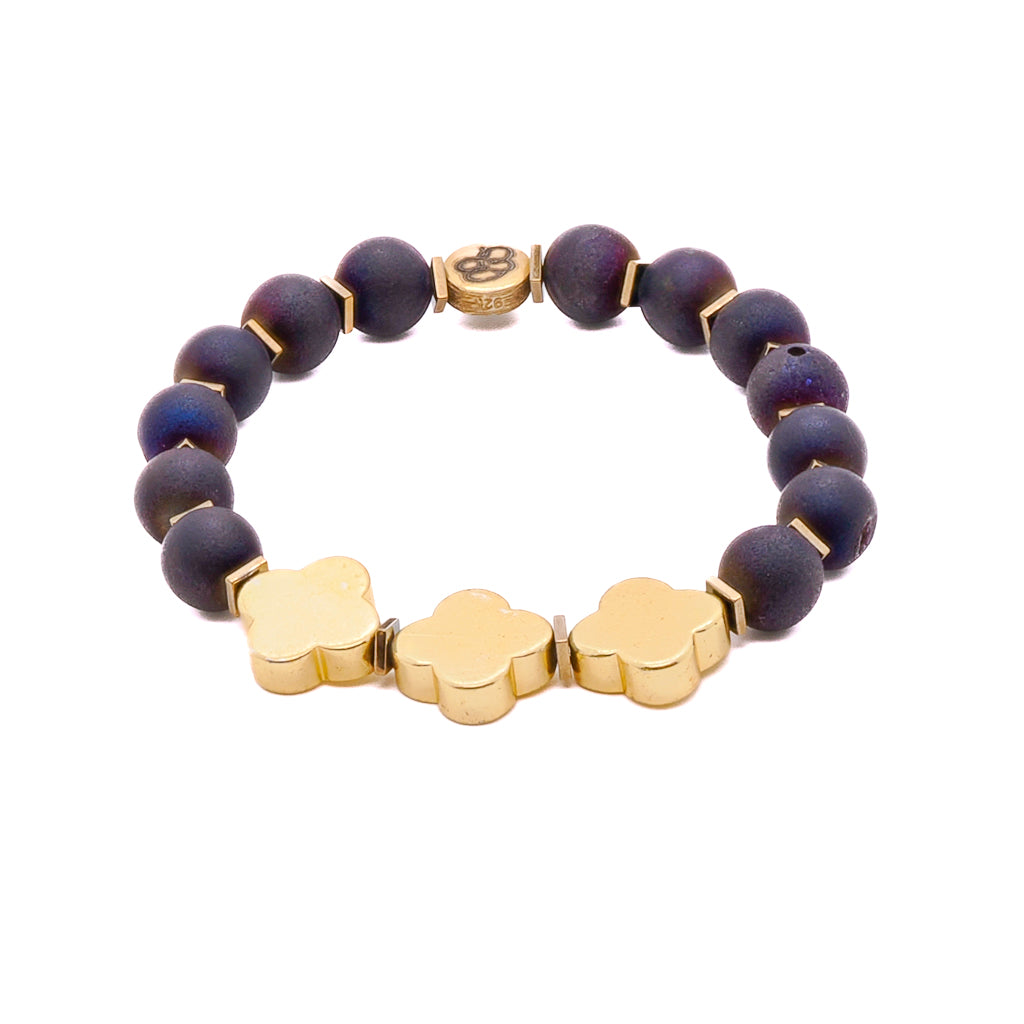 The Moroccan Flower Agate Bracelet, a mesmerizing handmade accessory featuring Druzy Agate stone beads and delicate gold color hematite Moroccan flower accents.