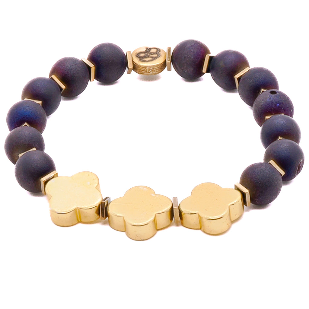 Experience the allure of the Moroccan Flower Agate Bracelet, showcasing the unique beauty of Druzy Agate stone beads and intricate gold color hematite Moroccan flower details.