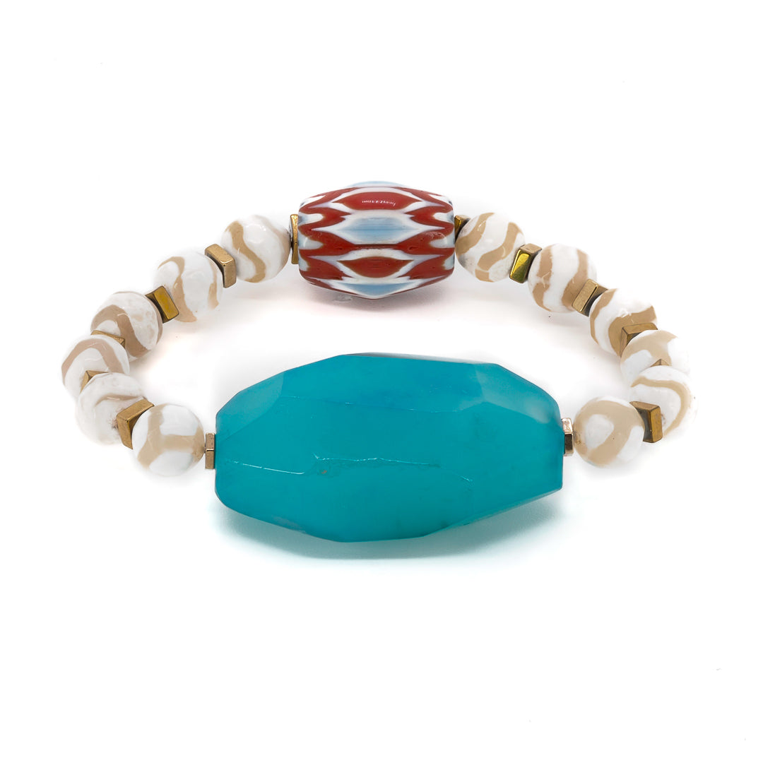 Discover the stunning combination of blue agate and white Nepal agate stone beads in the Nepal Blue Agate Bracelet.