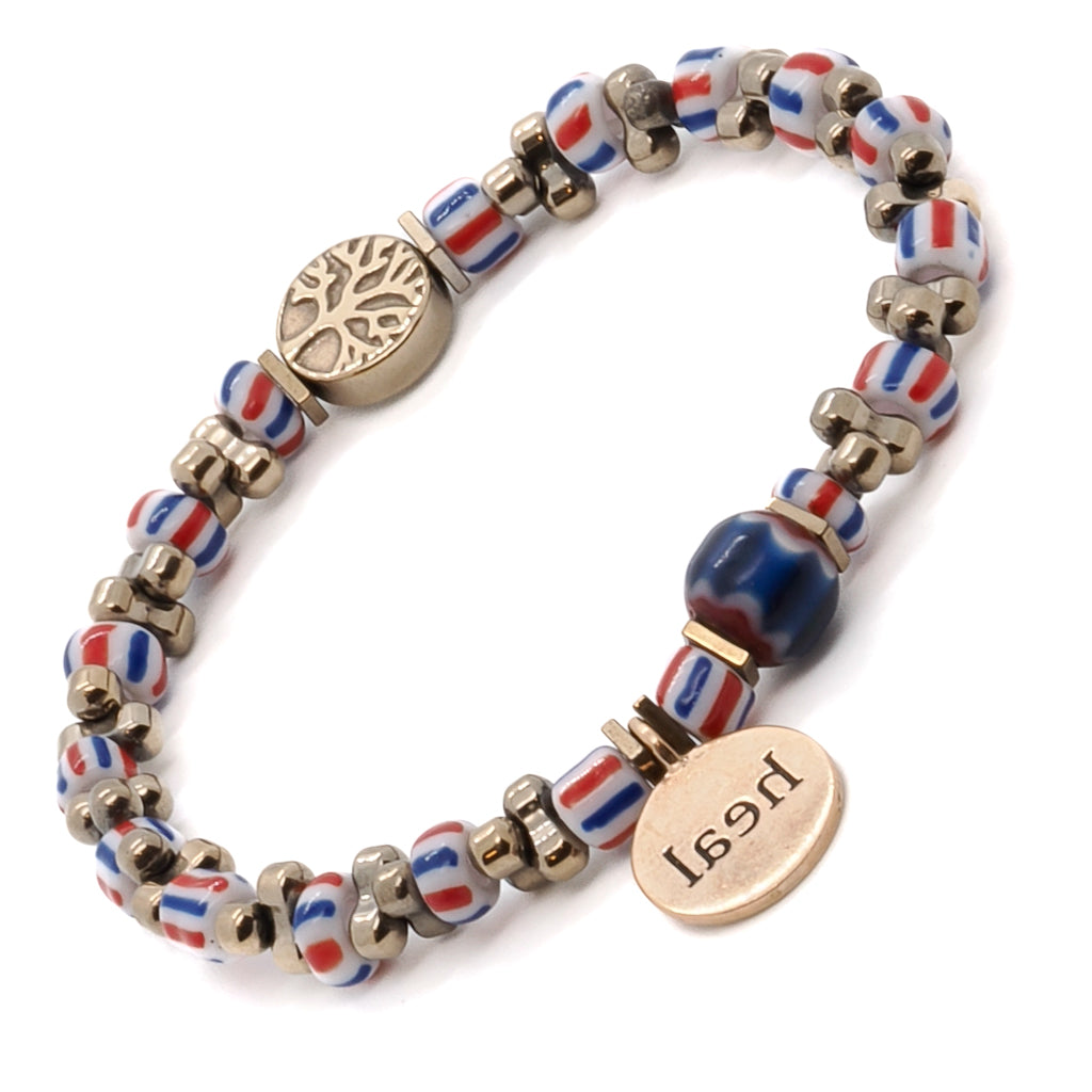 Experience the healing energy of the Nepal Heal Bracelet, crafted with a bronze heal charm, hematite tree of life bead, and gold hematite spacers.