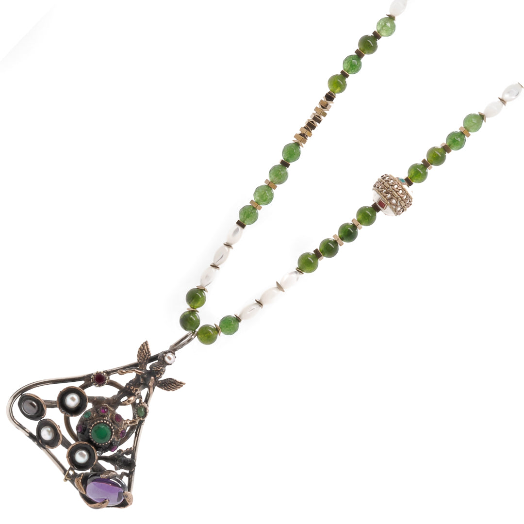 Iridescent Beauty - The Mother-of-Pearl Beads in the Handmade Necklace Reflect Light and Elegance.