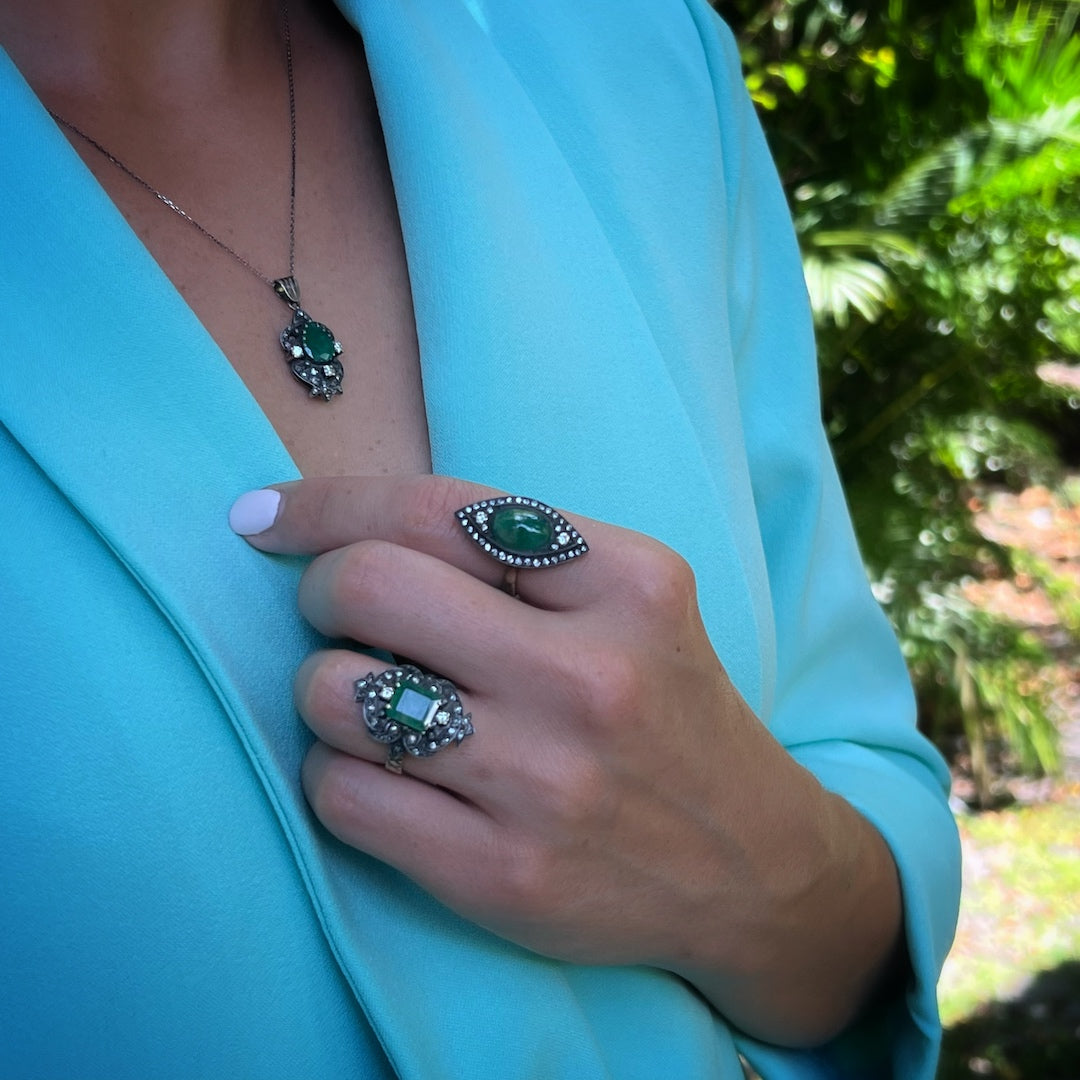 Spring Renewal - The vibrant green emerald symbolizes growth and renewal, model wearing