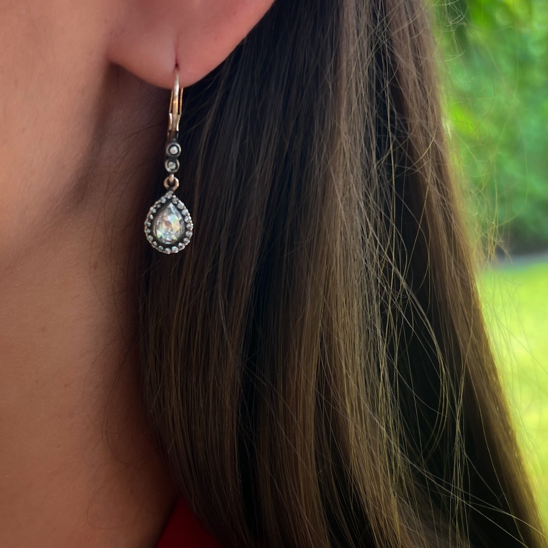 Timeless Beauty - Model Wearing Handcrafted Pear Shaped Earrings with confidence.