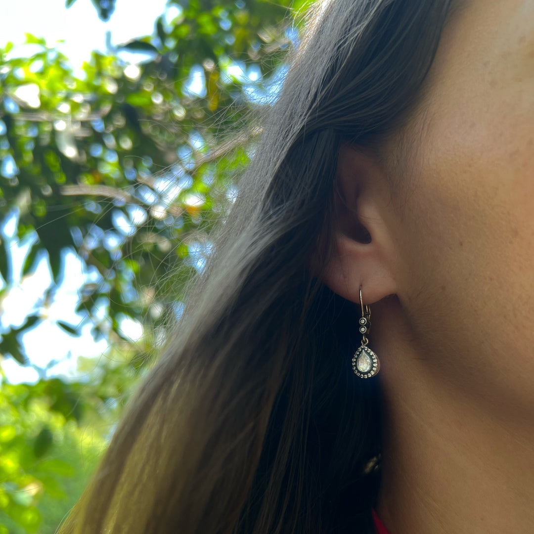 Model Wearing Pear Shaped Diamond Earrings - Embracing elegance and sophistication.