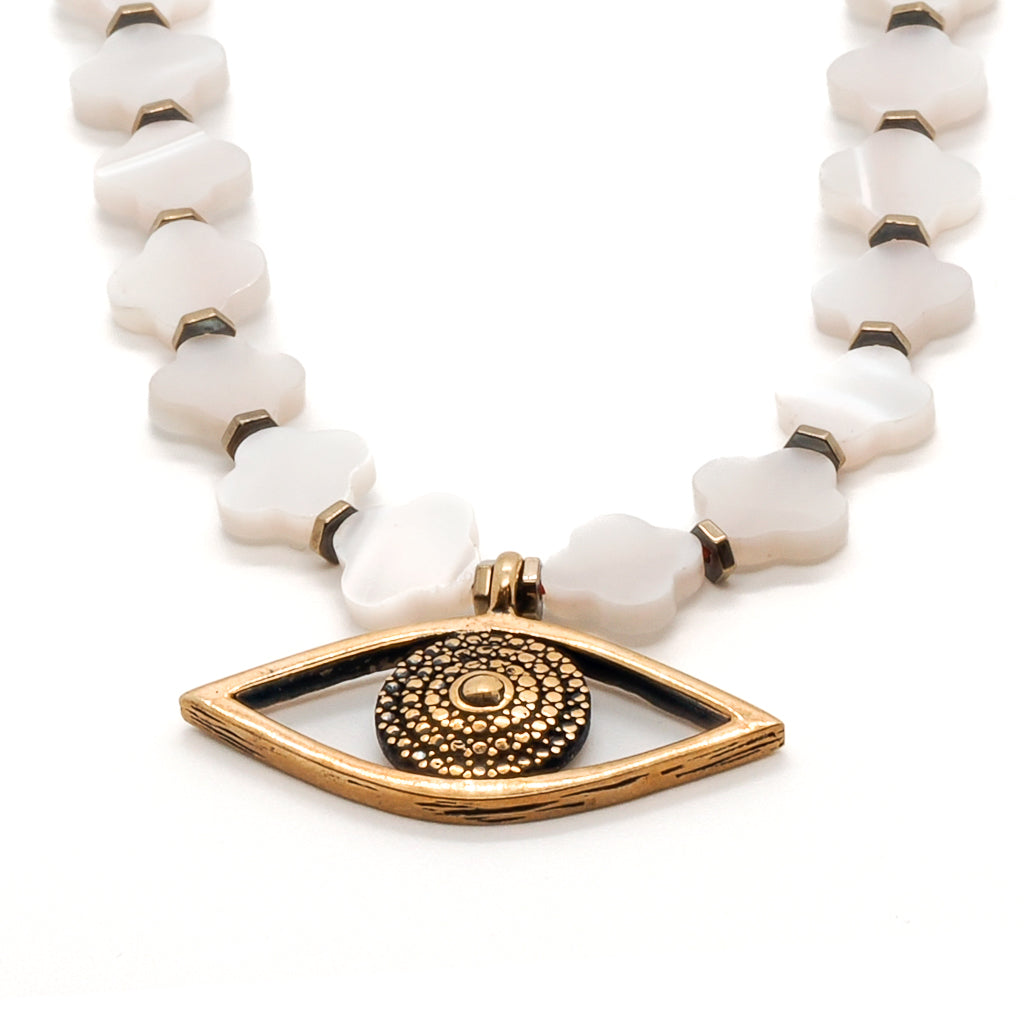 Eye-catching Necklace adorned with Mother of pearl clover beads and bronze Evil Eye.
