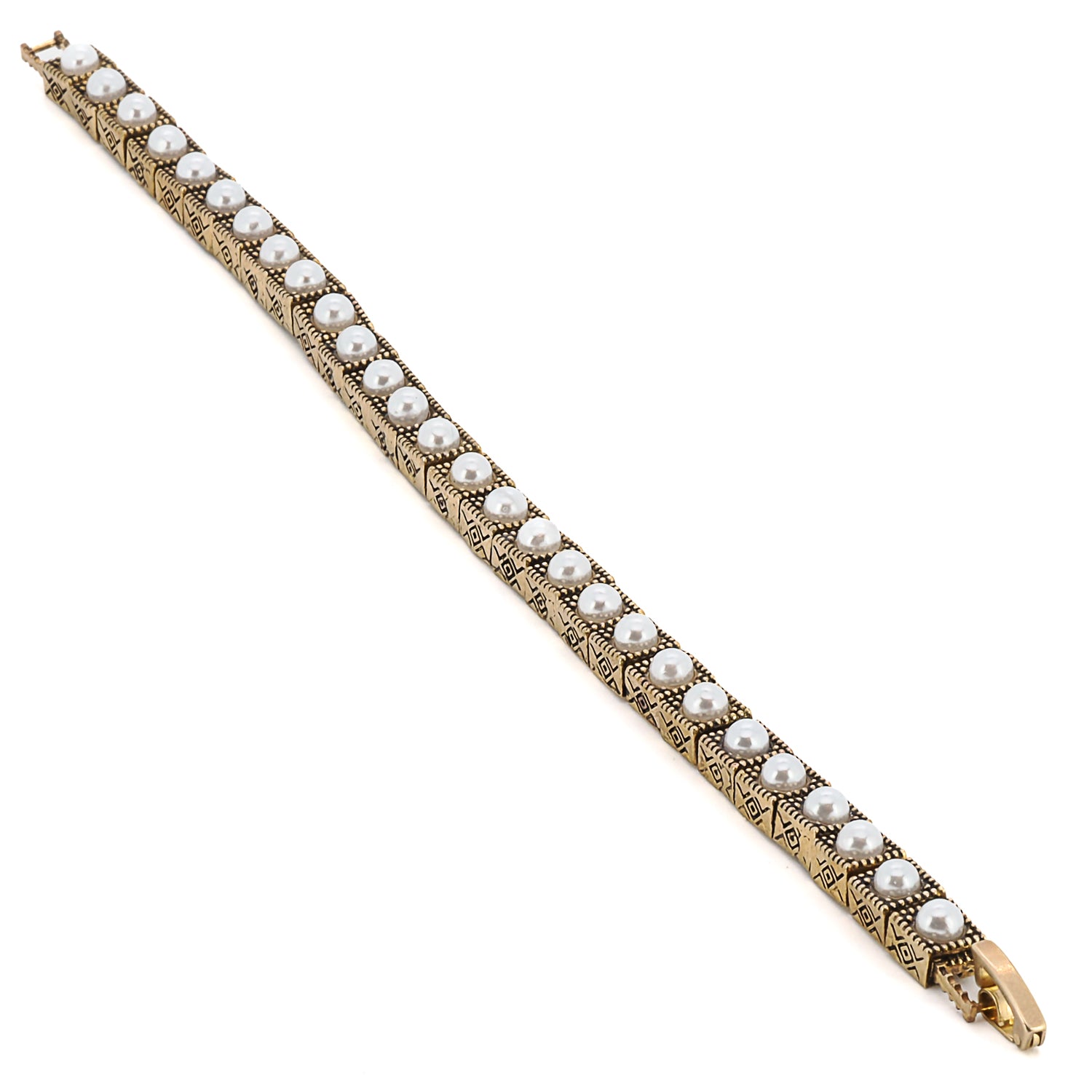 The handmade Pearl Tennis Bracelet, a symbol of elegance and refinement.