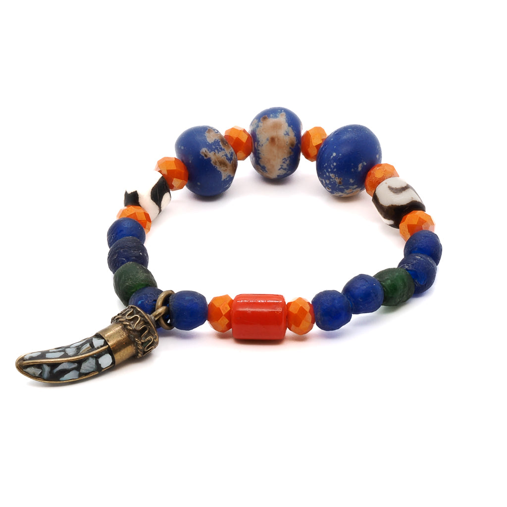 Embrace the joy and romance of summertime with the vibrant Summer Love Bracelet, adorned with orange crystal beads and a blue Nepal large bead.