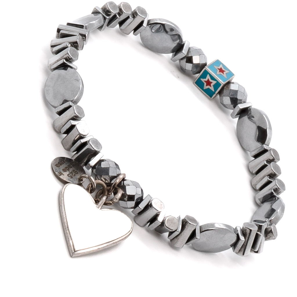 Admire the purity and charm of the Pure White Heart Bracelet, showcasing its sleek silver-colored hematite beads and exquisite heart charm.