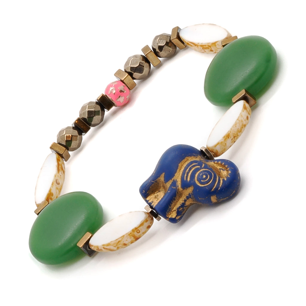 Discover the joy and elegance of the Purple Elephant Bracelet, adorned with green glass beads and gold hematite stones.