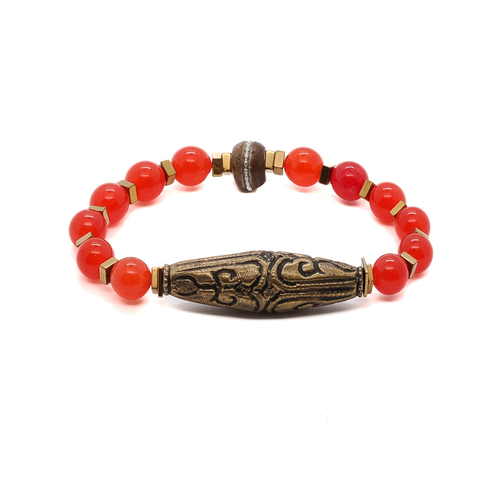 Embrace the vintage elegance of the Red Carnelian Vintage Bracelet, adorned with rich red carnelian stone beads and a stunning handmade Nepal brass charm.