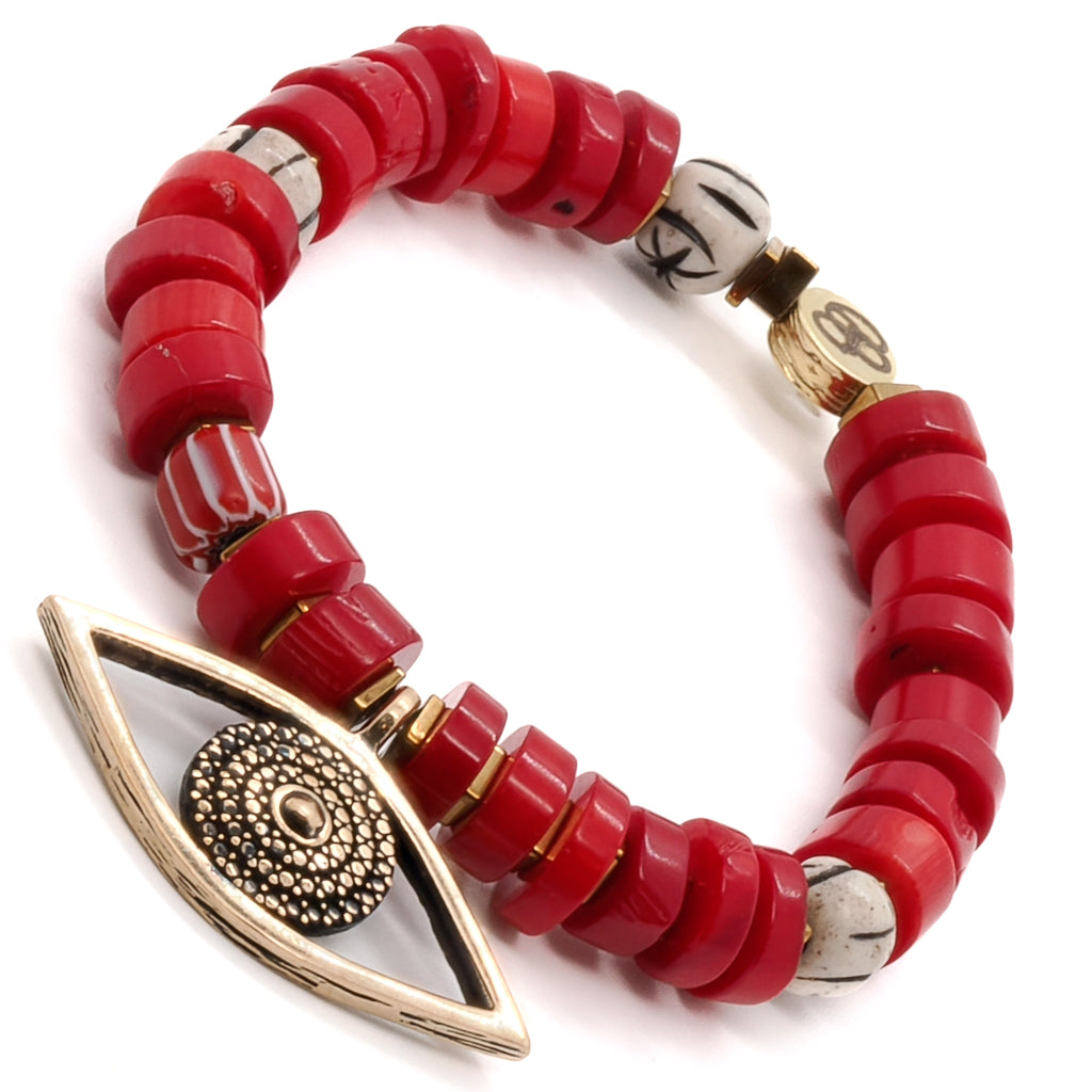Discover the spiritual and protective power of the Red Coral Evil Eye Bracelet, adorned with red coral beads and a large evil eye charm.