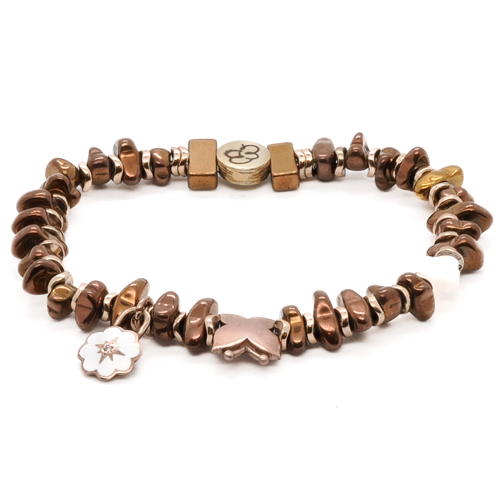 Enhance your femininity and style with the Rose Energy Spring Bracelet, adorned with rose gold hematite beads and elegant silver charms.