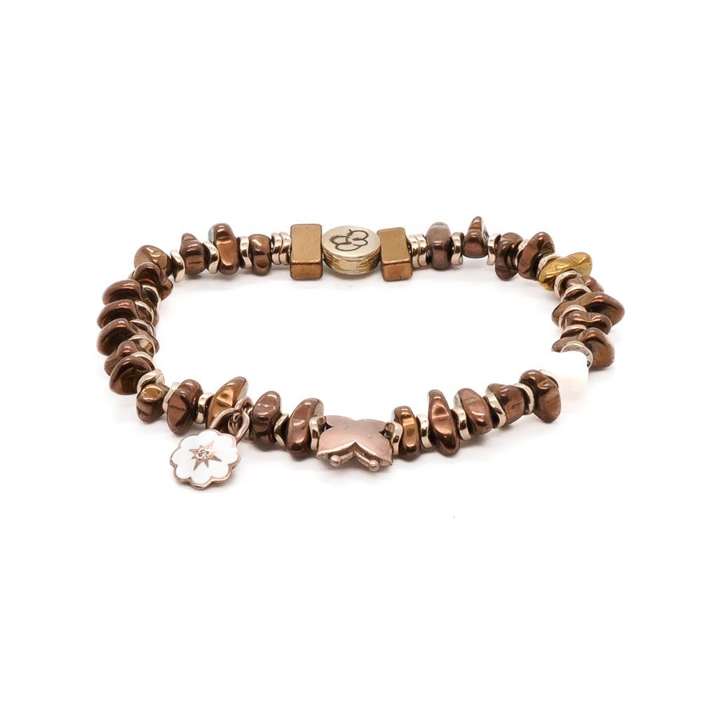 Embrace the elegance of the Rose Energy Spring Bracelet, adorned with rose gold hematite beads and delicate silver charms.