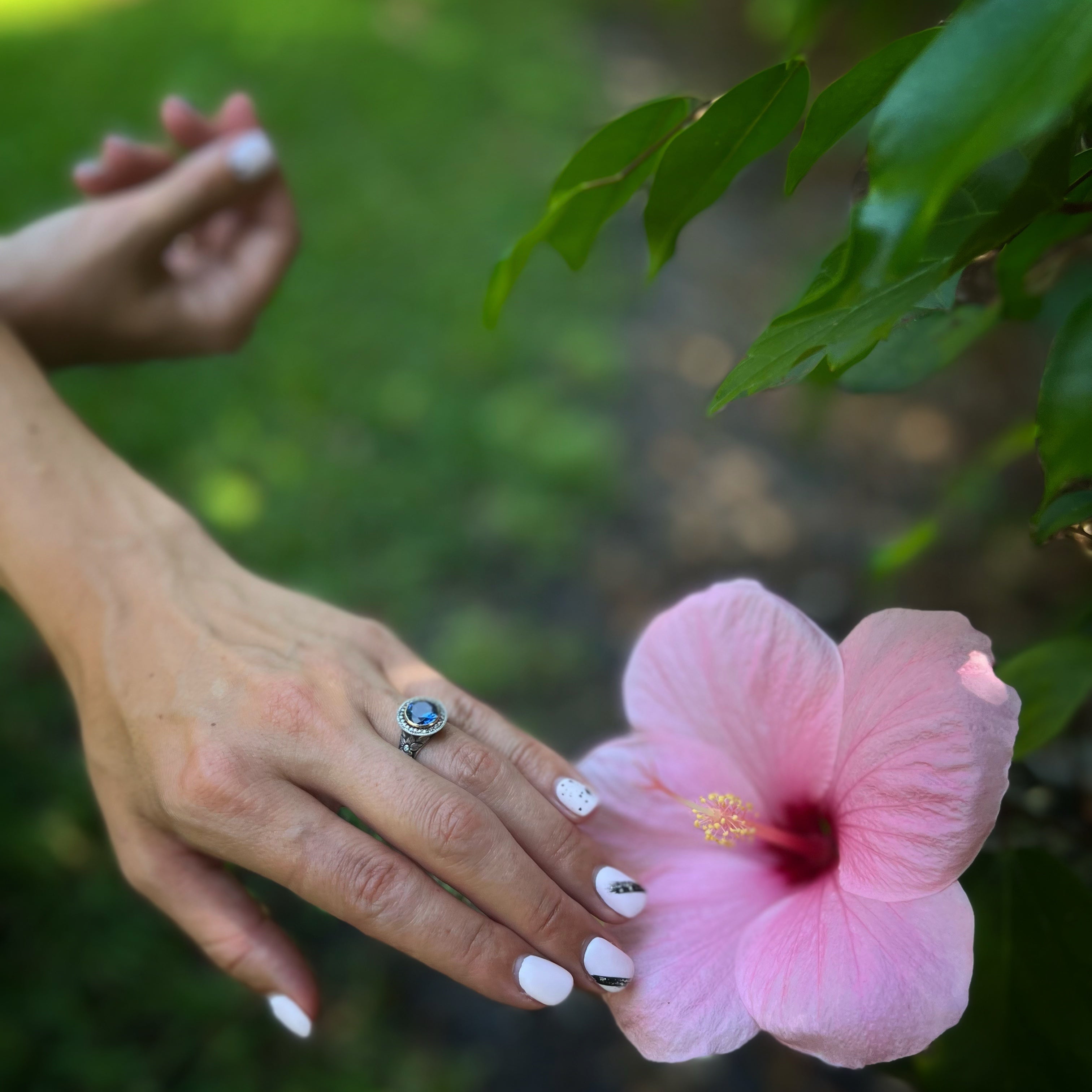 Unique and Meaningful - Model Wearing Sapphire Engagement Ring.