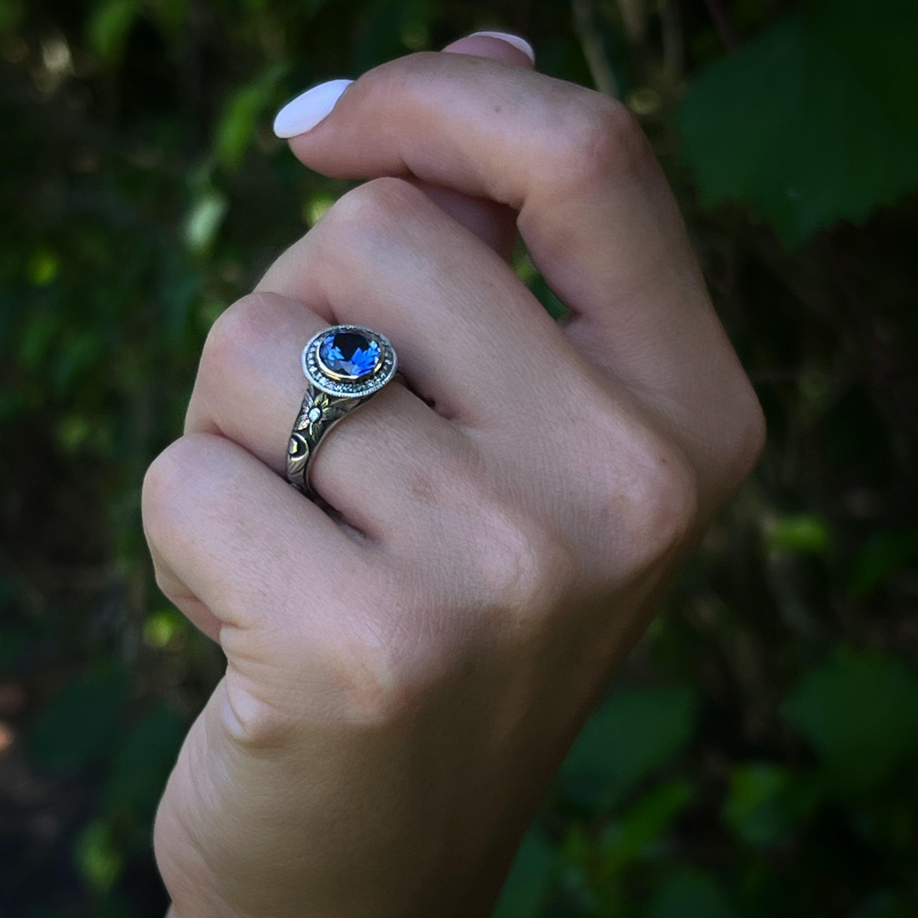 Model Wearing Sapphire Engagement Ring - Embracing the timeless and elegant look.
