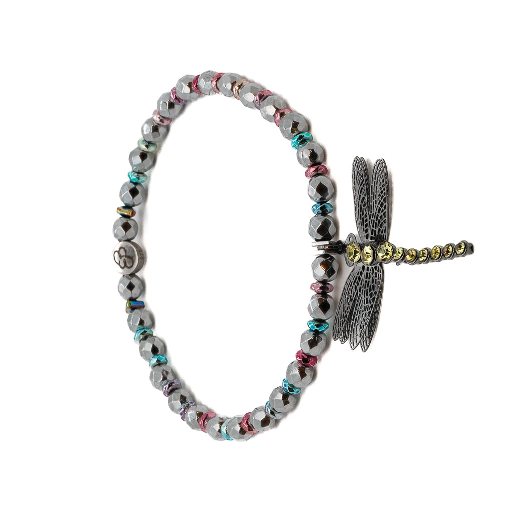 Discover the power of self-love with the Self Love Dragonfly Anklet, adorned with silver hematite stone beads, blue and pink hematite spacers, and a silver dragonfly charm that represents personal transformation and resilience.