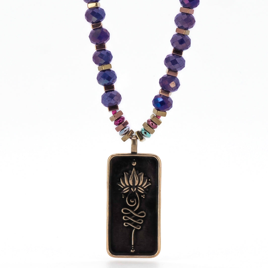Close-up of the Unalome pendant on the Self Love Necklace, radiating positive energy and self-empowerment.